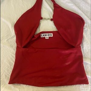 i am gia red top small deodorant stains but never worn out only tried on